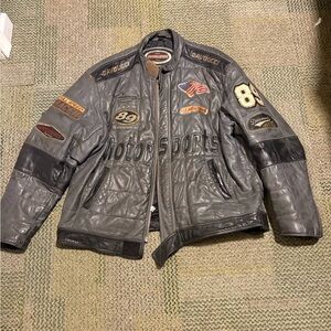 Davoucci Motorsports leather motorcycle jacket. Slight distressing in arms sizeL